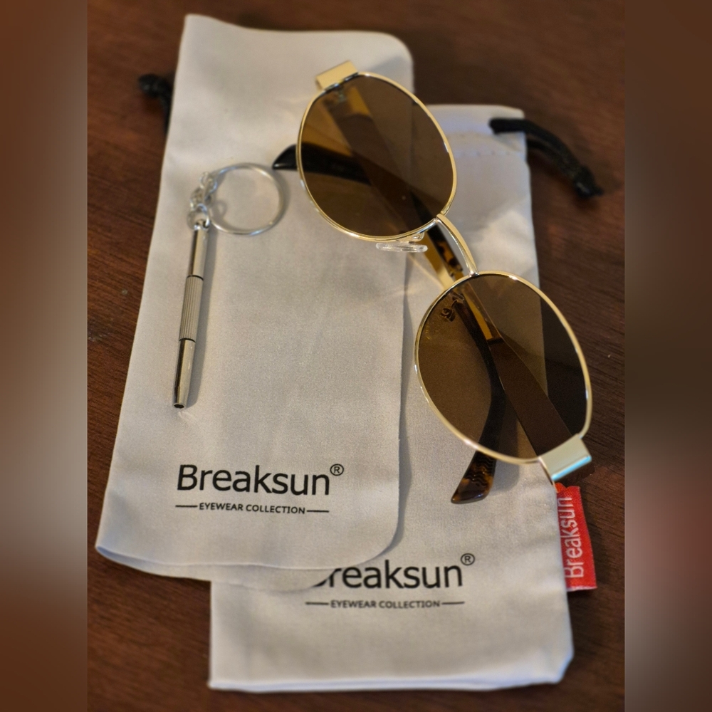 Elegant Gold Oval Sunglasses